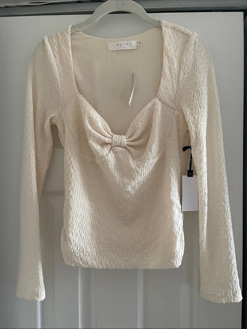 Astr Cream Long Sleeve Knot-Front Textured Top
